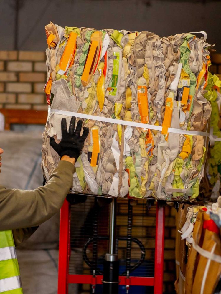 Industrial Waste Removal worker at a waste station